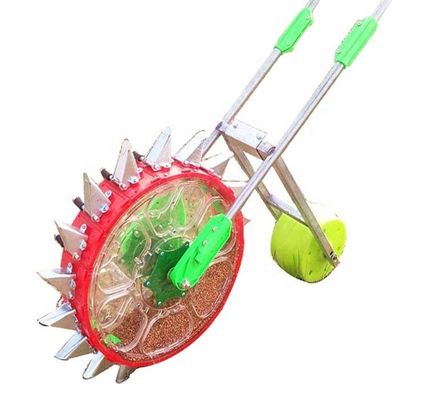 kwaliteit  Farm machinery hand push vegetable seeder machine seed planter peanut bean onion seed planter small fabriek